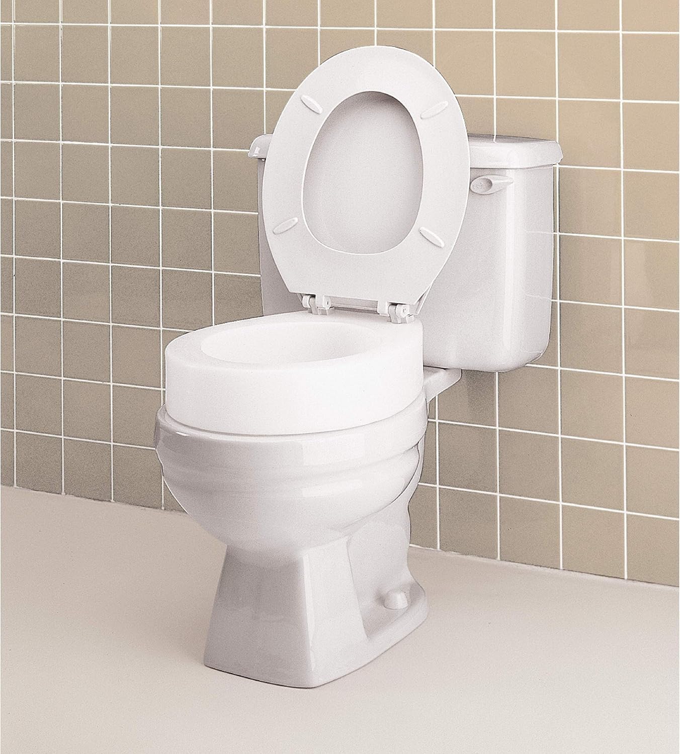 Carex Toilet Seat Riser, Elongated Raised Toilet Seat Adds 3.5 inches to Toilet Height, Assists with Bending or Sitting, Bolt-On Installation Under Existing Toilet Seat, 300 Pound Weight Capacity