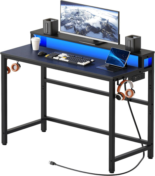 YATINEY Small Computer Desk with Charging Station and LED Lights, Gaming Desk with Monitor Stand, 2-Tier Home Office Desk with 4 Side Hooks, for Living Room, Home Office, Black DN01UDBBY2