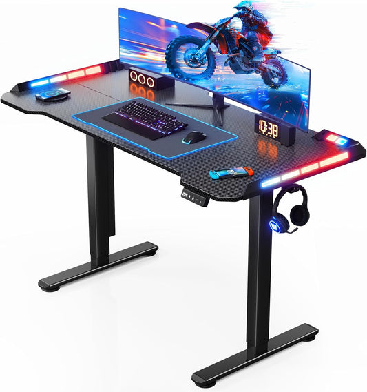 Flycity Gaming Standing Desk with LED Lights & APP Control, 48" x 24" Gaming Table with Music Sensing, Underdesk Cable Storage Electric Standing Desk, Black Carbon Fiber PC Desk for Home Office