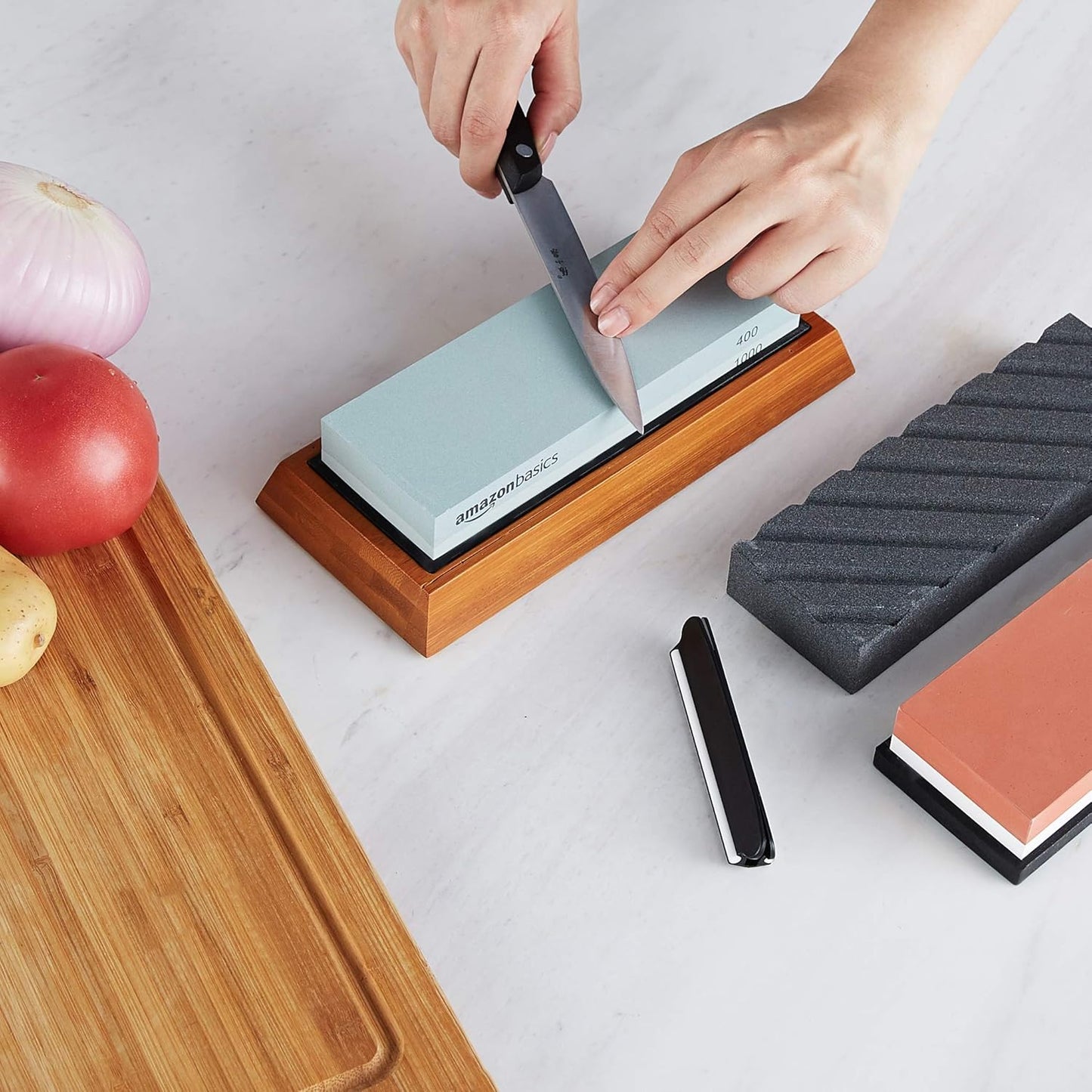 Amazon Basics Whetstone Knife Sharpening Stone Set, Double-sided 400/1000 and 3000/8000 Grit Stones, Flattening Stone with Angle Guide, Non-Slip Bamboo Base, 3 Count, Black & Grey