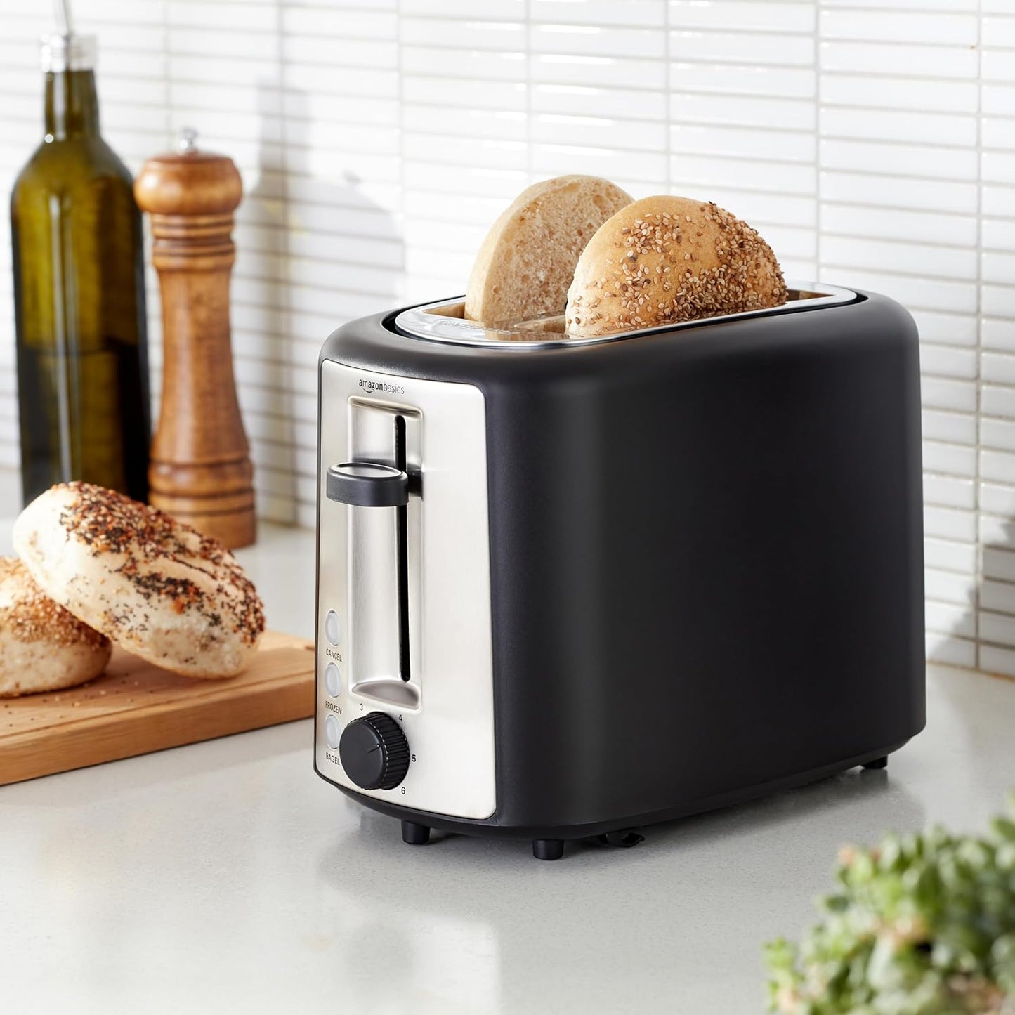 Amazon Basics 2 Slice Toaster, Extra Wide Slots for Bagels, 6 Browning Settings, Removable Crumb Tray, Defrost/Cancel/Bagel Buttons, Cord Wrap, 900W, Black & Silver