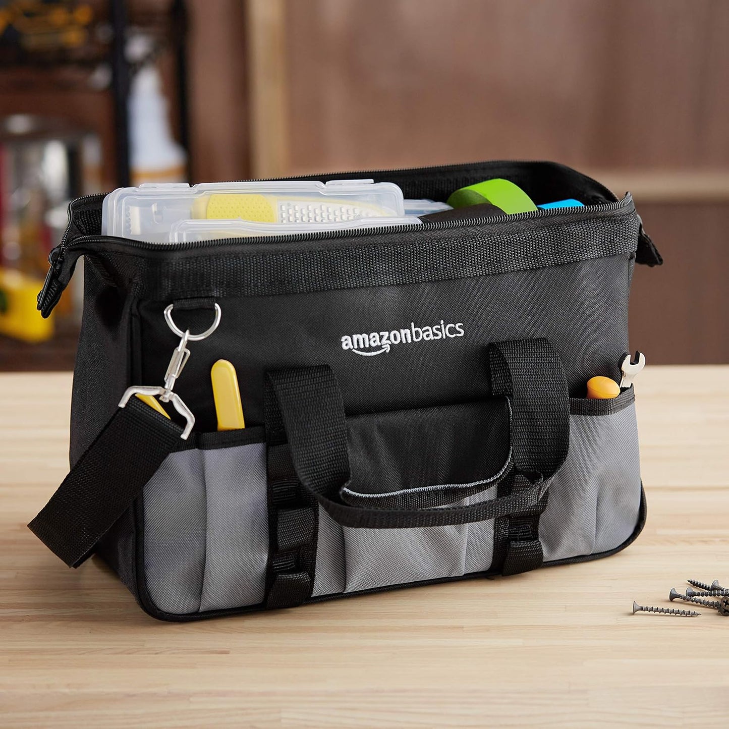 Amazon Basics Durable Wear-Resistant Tool Storage Bag with Adjustable Shoulder Strap, Portable Tool Organizer, 16 Pockets, 12 in, Black & Gray